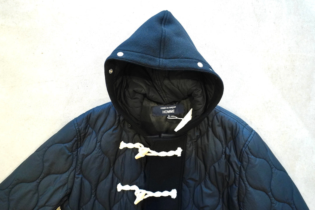 COMME des GARCONS HOMME / WOOL MELTON × NYLON QUILTING DUFFLE COAT