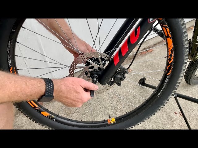 How To Remove A Bike Wheel With Disc Brakes - YouTube