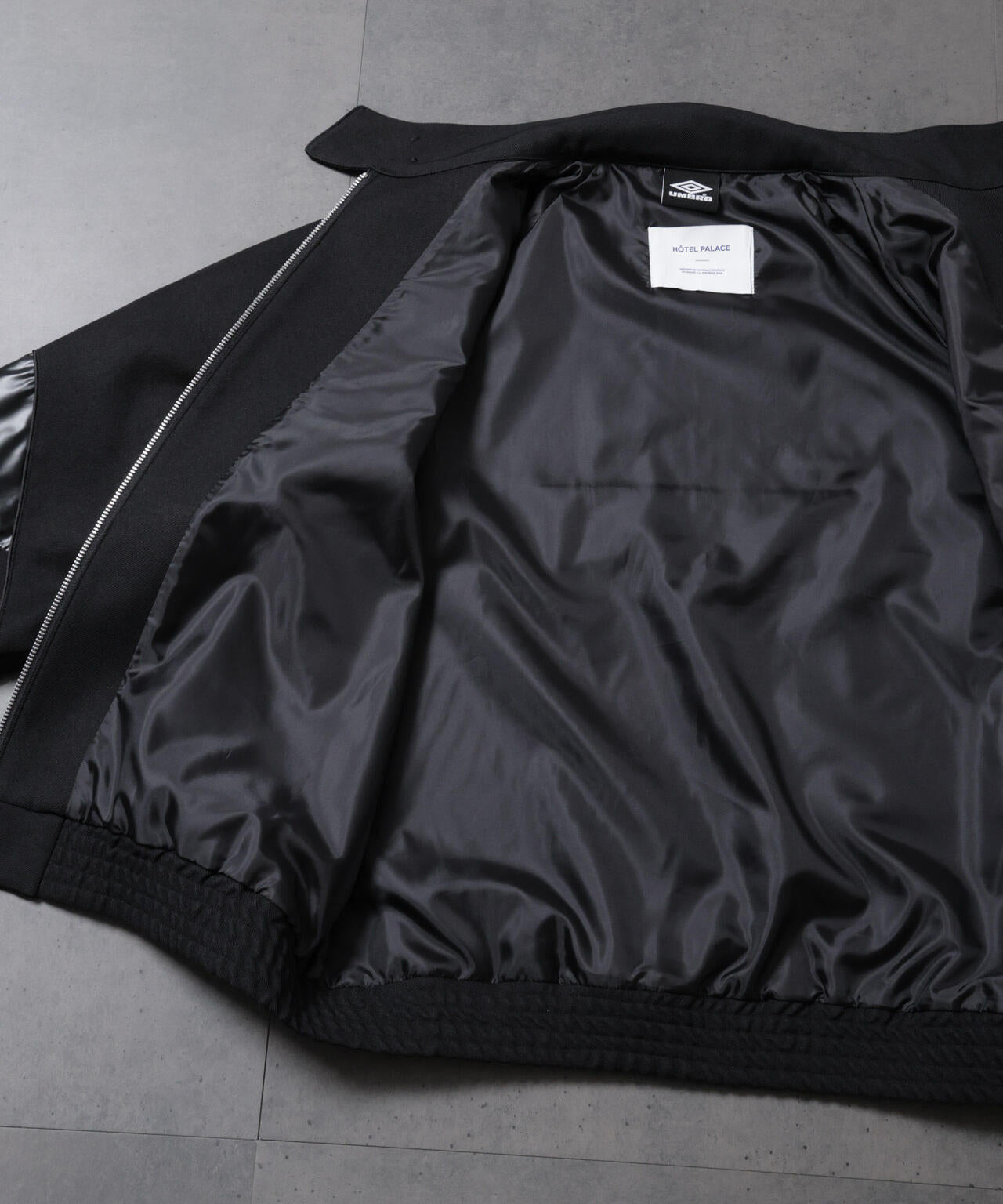 HOTEL PALACE(オテルパラス)xアンブロ シャイニーツイルハリントン